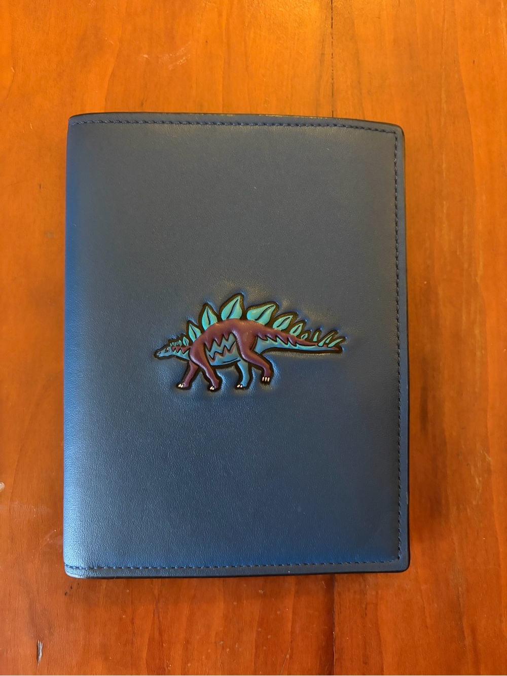 COACH- Limited Edition Stegosaurus Passport Cover